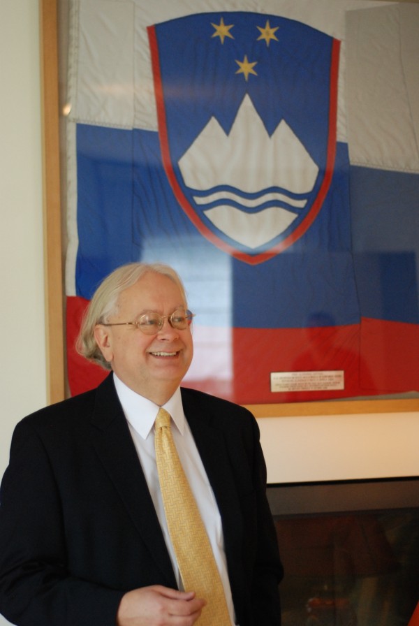 Ambassador Šinkovec and the first Slovenian flag used at the NATO headquarters - Picture by Embassy of Slovenia in Brussels.
